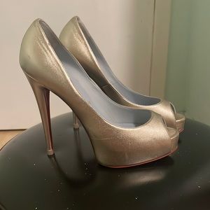 Christian Louboutin Stilettos. Good condition. Size 8. But fits slim size 7.